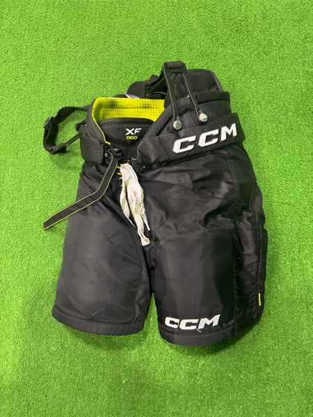 Black Junior Medium CCM Tacks XF Pro Hockey Pants (Used)