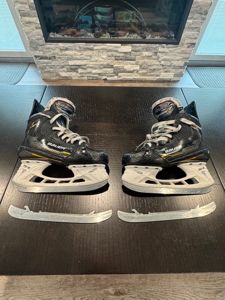 Bauer Supreme M5 Pro Skates with extra set of runners. Size 4