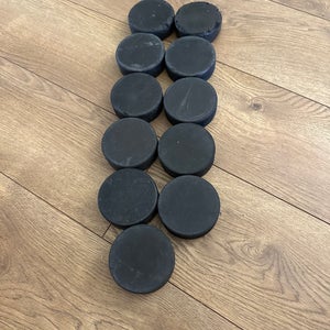 11 Ice Hockey Pucks