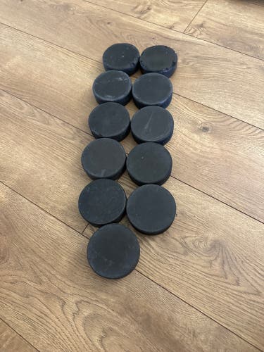 11 Ice Hockey Pucks