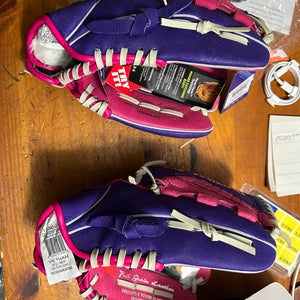 Lot of 2 new girls softball gloves 10inch