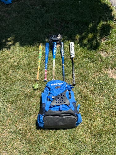 Baseball Bats, One Glove And A Bag