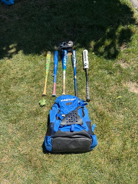 Baseball Bats, One Glove And A Bag