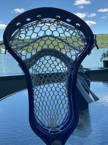 Used maverick head dyed blue strung
