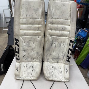 White Used 28" Junior CCM Extreme Flex E3.5 Goalie Leg Pads