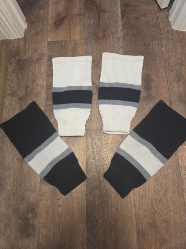 Set of two - one Black and one white LA Kings knit Youth Small Socks (Used)