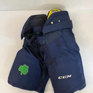 Used Navy Senior Medium CCM HPTK Pro Stock Hockey Pants