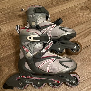 Roller Blades (size 8) with a set of protective pads
