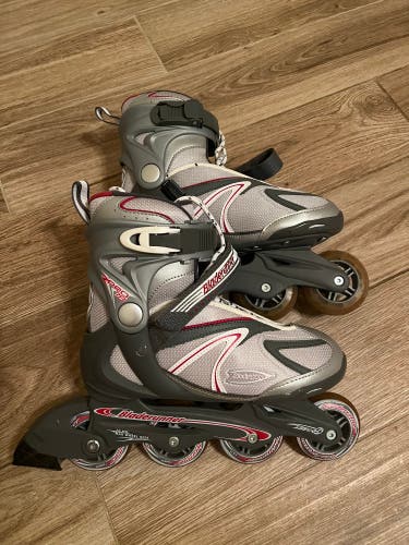 Roller Blades (size 8) with a set of protective pads