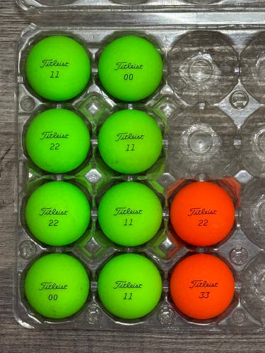 10 Titleist Velocity Golf Ball - Green and Orange Color