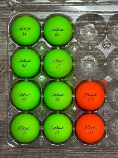 10 Titleist Velocity Golf Ball - Green and Orange Color