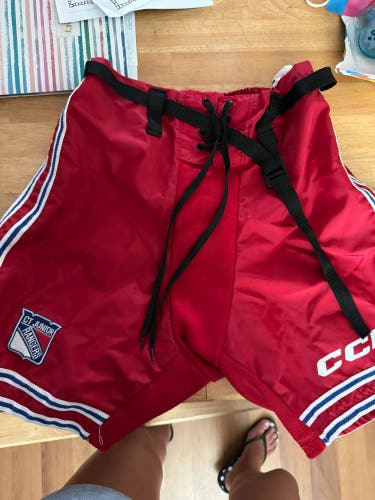 Red  Youth Large CCM Pant Shell  (Used)