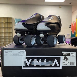 VNLA Junior Tuxedo quad skates