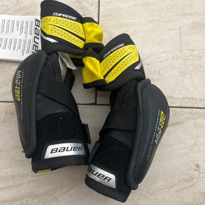 Bauer supreme ultrasonic elbow pads And CCM LTP 11” Shin Guards youth