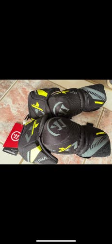New warrior alpha Junior large hockey elbow pads