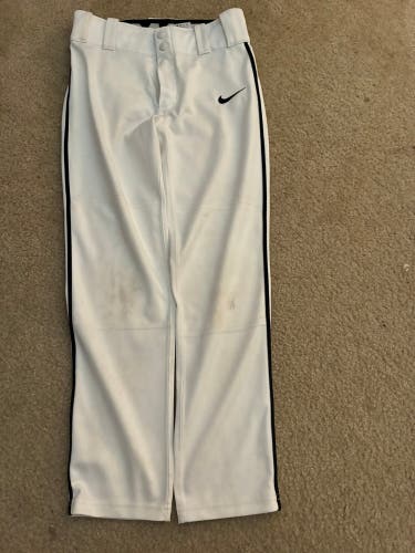 Youth Nike tapered white pants with black piping Medium
