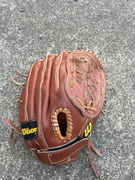 A Wilson, a 2124 signature model baseball glove.