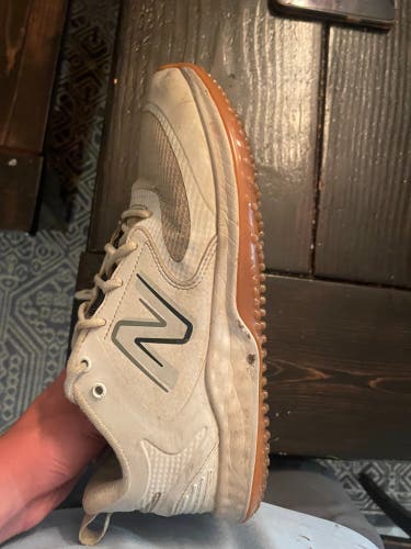 White Adult Size M 9.0 New Balance Turf Cleats (Used)