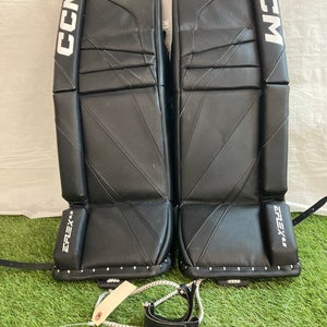 Black 28" Junior CCM Eflex 6.5 Goalie Leg Pads (Used)