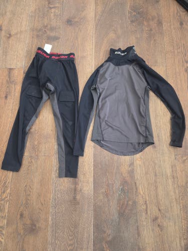 Bauer Youth XS set of neck protection shirt and compression pants with cup and velcro (Used)