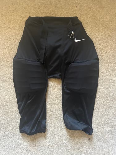Black Nike padded football pants