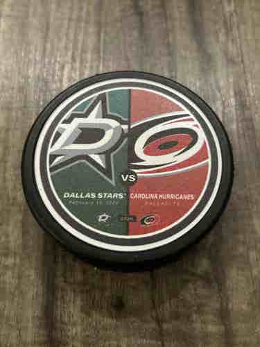 Dallas Stars vs Carolina Hurricanes NHL Match Up Hockey Puck