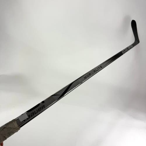 Used Left Silver Bauer Vapor Hyperlite 2 | 70 Flex P28 Curve Grip | E752
