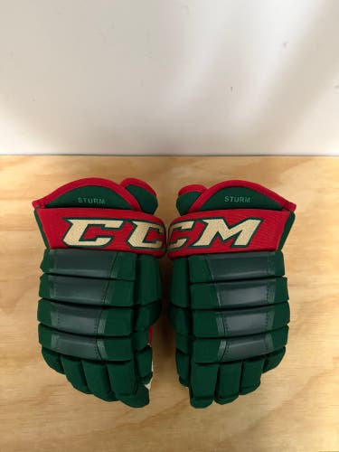 Used Minnesota Wild CCM HG97 gloves size 14