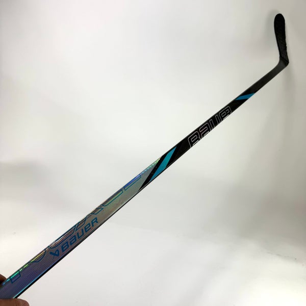 Repaired Left Handed Bauer Nexus Tracer | 77 Flex P28 Curve Grip | E695