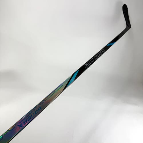 Repaired Left Handed Bauer Nexus Tracer | 77 Flex P28 Curve Grip | E694