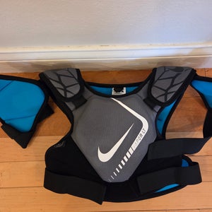 Nike youth medium lacrosse chest protector meet NOCSAE standards