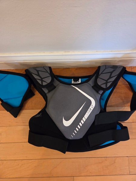 Nike youth medium lacrosse chest protector meet NOCSAE standards