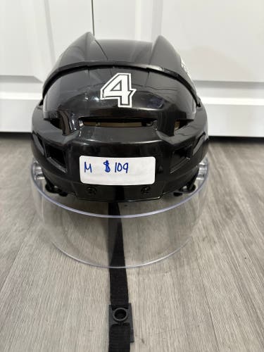 Used Charlotte Checkers Medium CCM Pro Stock #4 Vector V08 Helmet