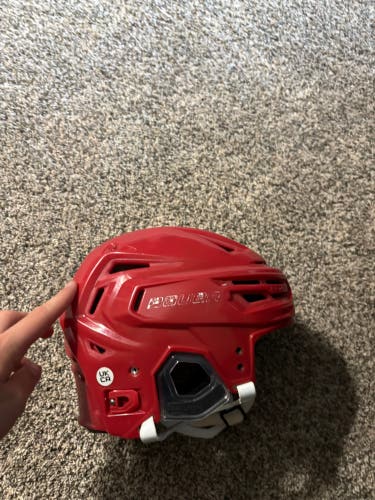 Hockey player helmet