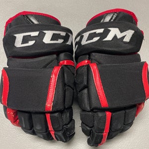 Black Senior CCM HG12 Gloves 14" Pro Stock BlackHawks (Used)