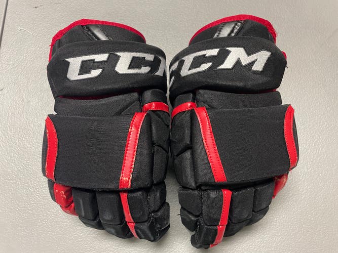 Black Senior CCM HG12 Gloves 14" Pro Stock BlackHawks (Used)
