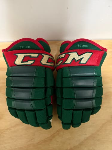 Used Ccm hg97 Minnesota Wild gloves size 14