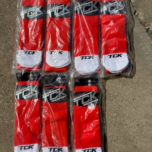 TCK over the calf softball/baseball socks. New in package! Size MEDIUM