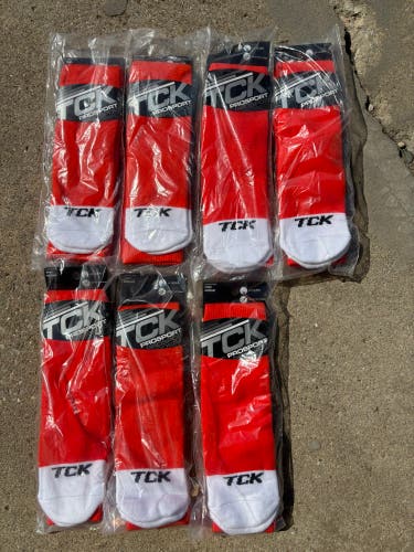TCK over the calf softball/baseball socks. New in package! Size MEDIUM