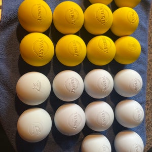 20 New, Lightly used lacrosse balls(10 yellow, 10 white)