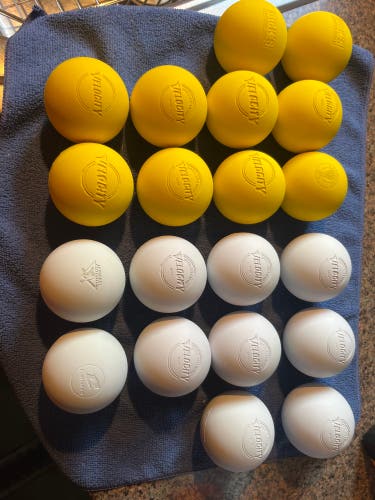 20 New, Lightly used lacrosse balls(10 yellow, 10 white)