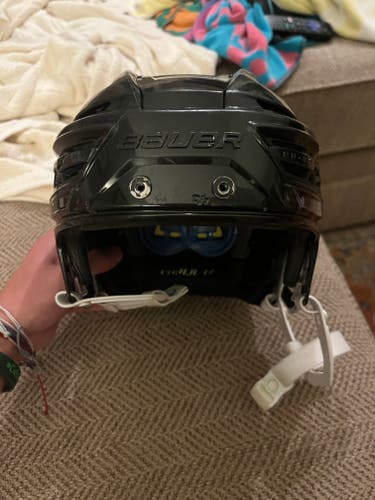 Black used Medium Bauer Re-Akt 150 Helmet (Used)