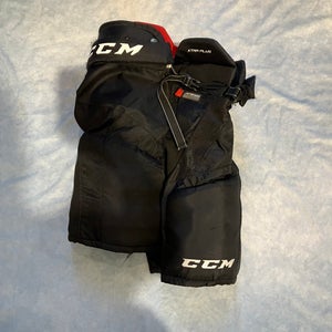 Black Junior Large CCM Xtra pro Hockey Pants (Used)