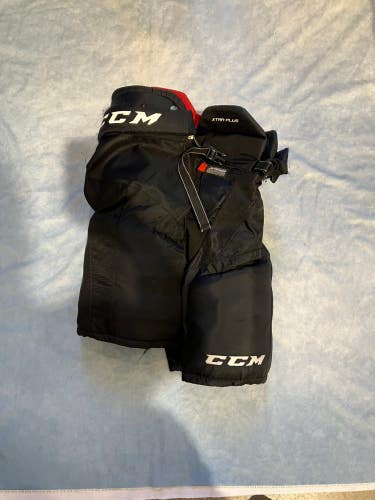 Black Junior Large CCM Xtra pro Hockey Pants (Used)