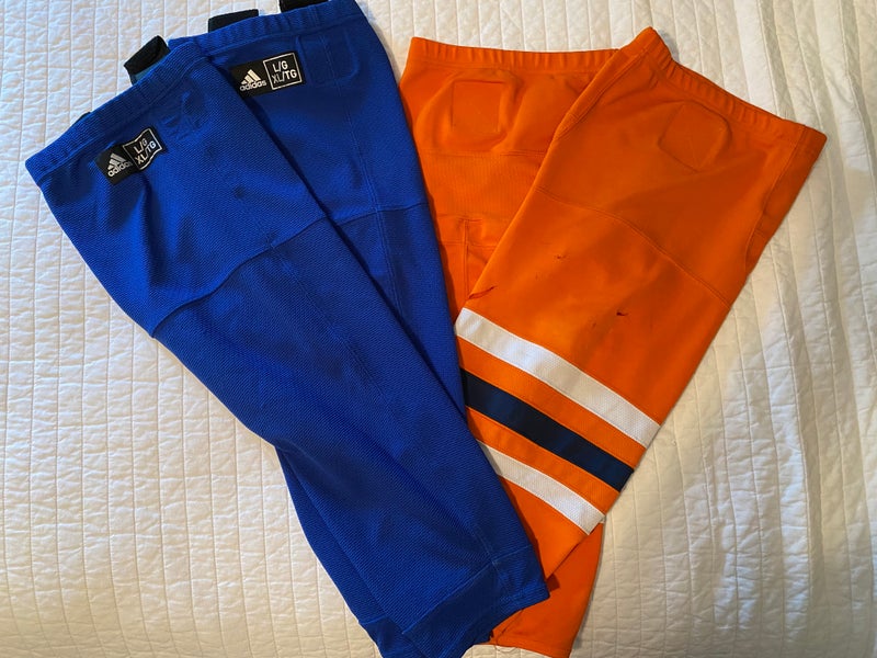 Two pair 23" & 24" Hockey Socks (Solid Blue & Orange Striped)