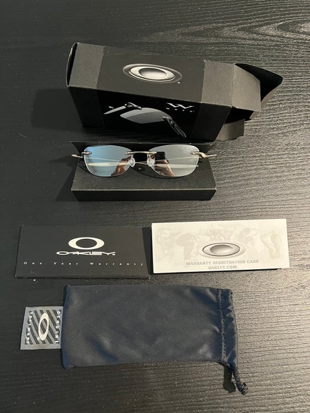 Silver Oakley Sunglasses (Used)