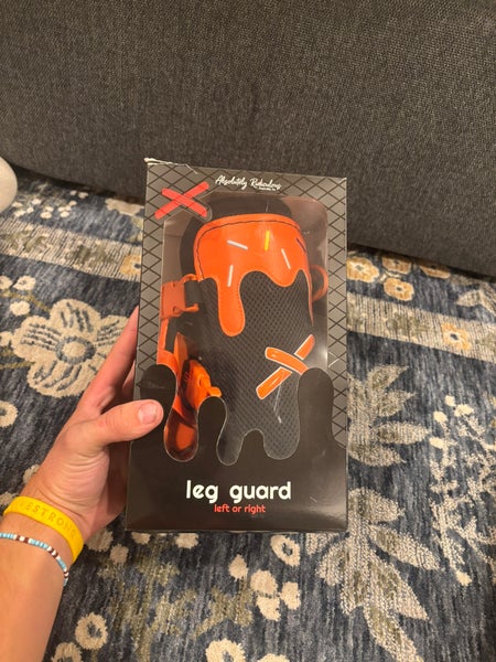 Black and orange Senior leg guard