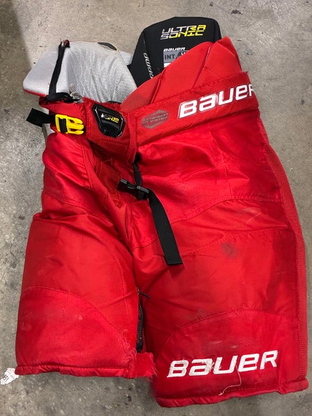 Red Intermediate Large Bauer Supreme Ultrasonic Hockey Pants (Used)