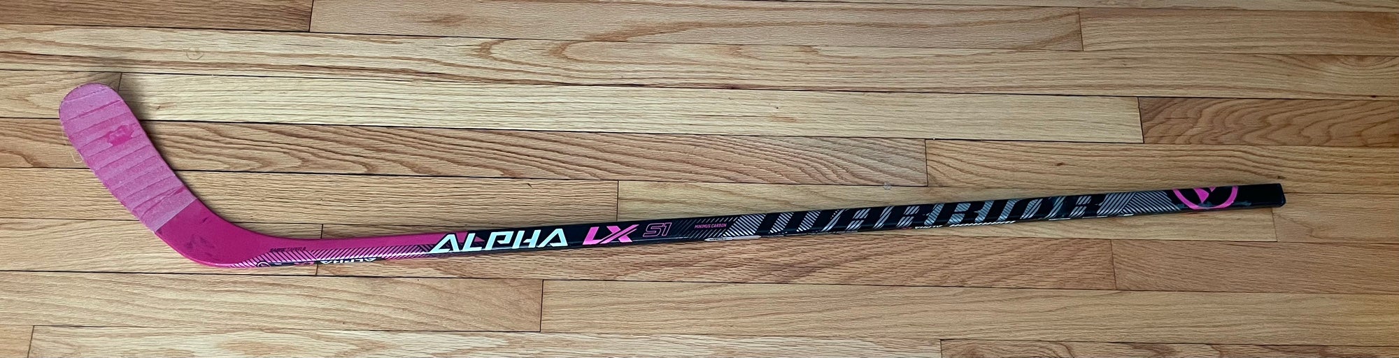 Pink And Black Youth Warrior Alpha LX Right Handed Hockey Stick   (Used)
