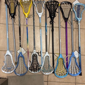 12 lacrosse sticks on hold for someone